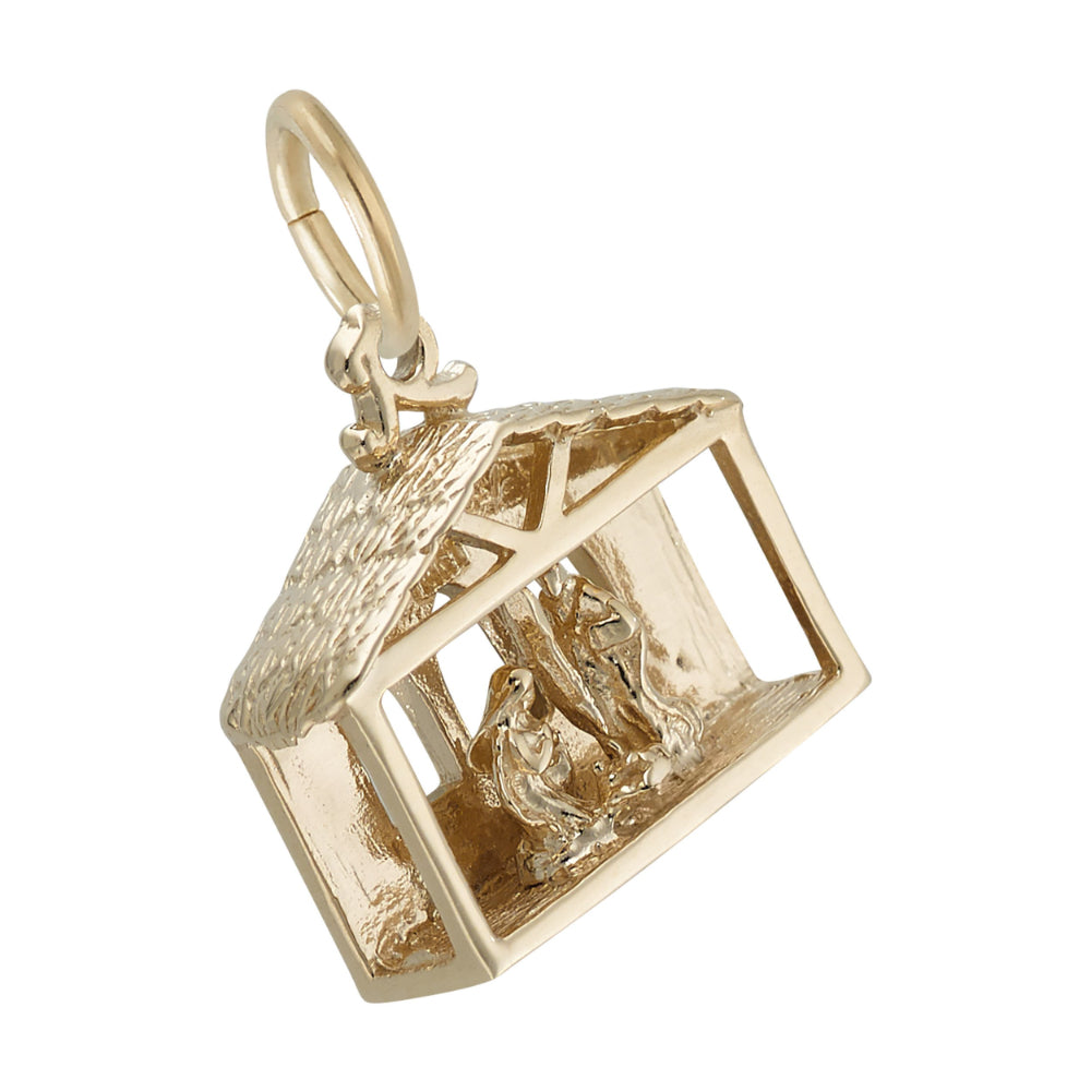 3/4 view of gold nativity scene charm with detailed roof, shown on a white background