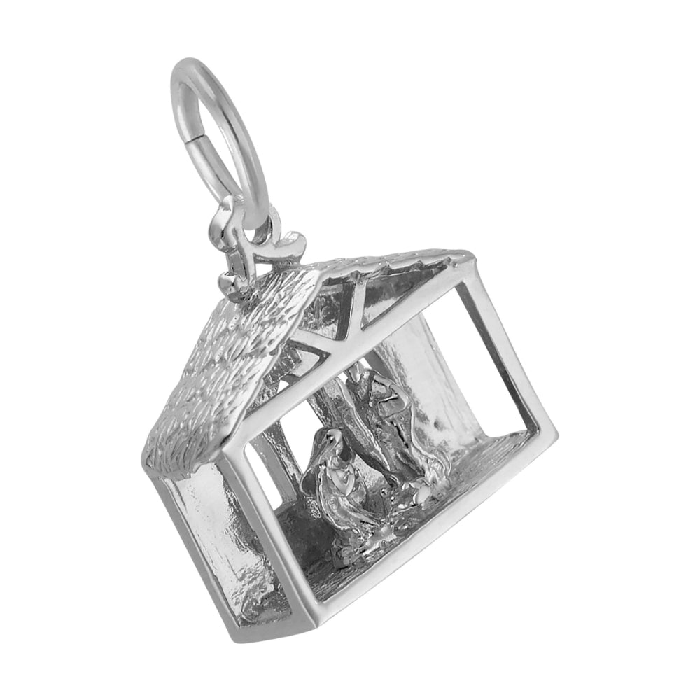3/4 view of Silver nativity scene charm with detailed roof, shown on a white background