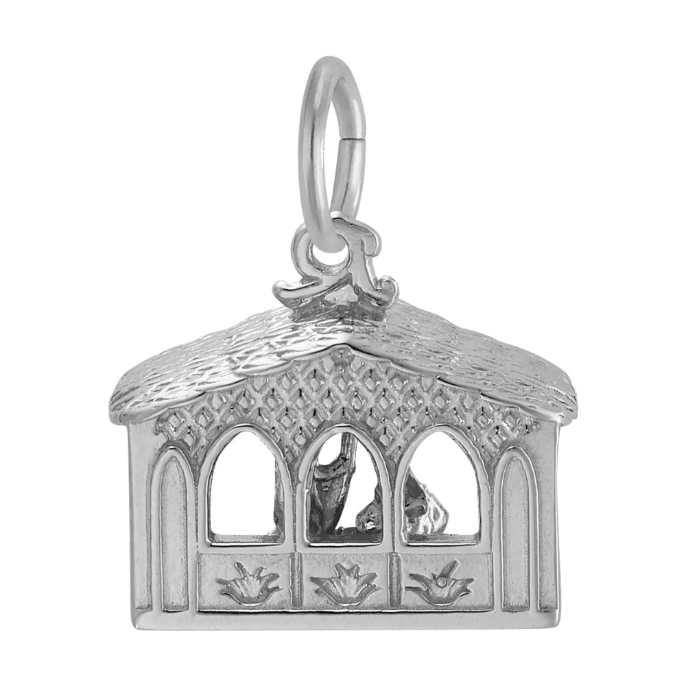 Silver nativity scene charm with detailed roof and wall, shown on a white background