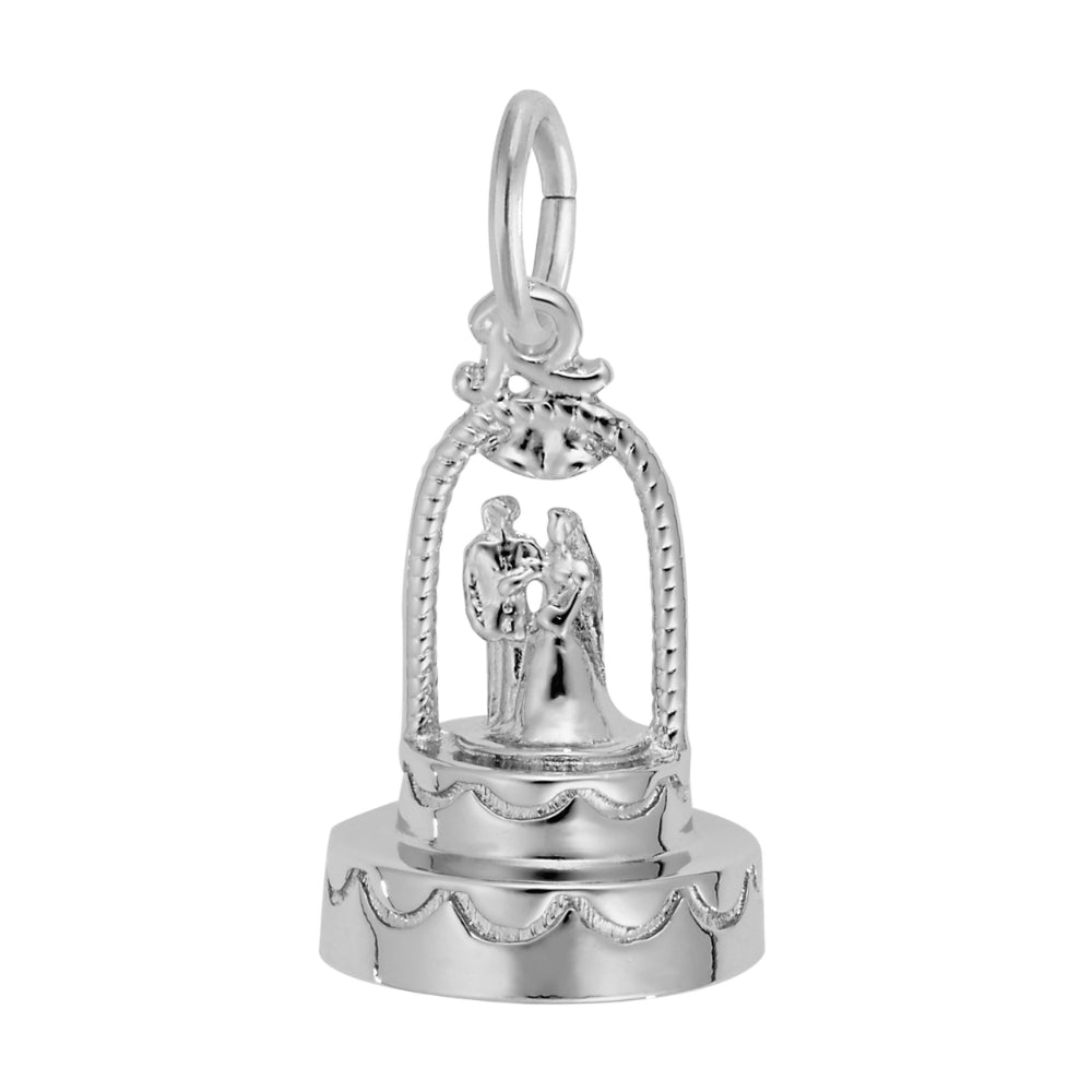 Silver tiered wedding cake with bride and groom topper, shown on a white background 