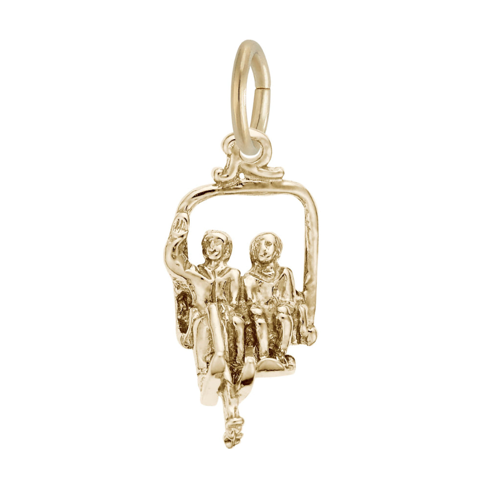 A gold charm pendant depicting two people sitting in a swing or gondola, shown on a plain white background.