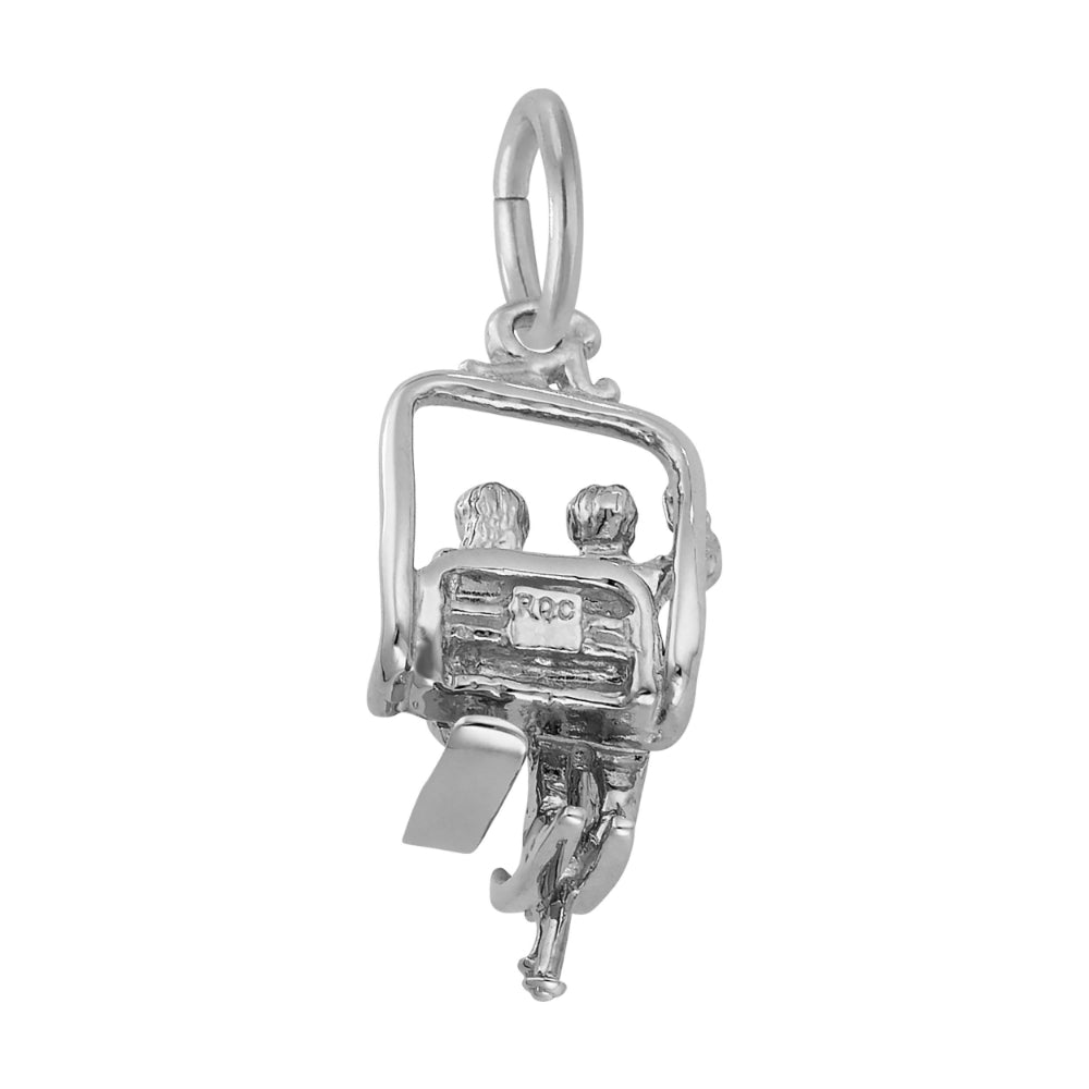Back of Silver charm of two people on a ski lift on a white background