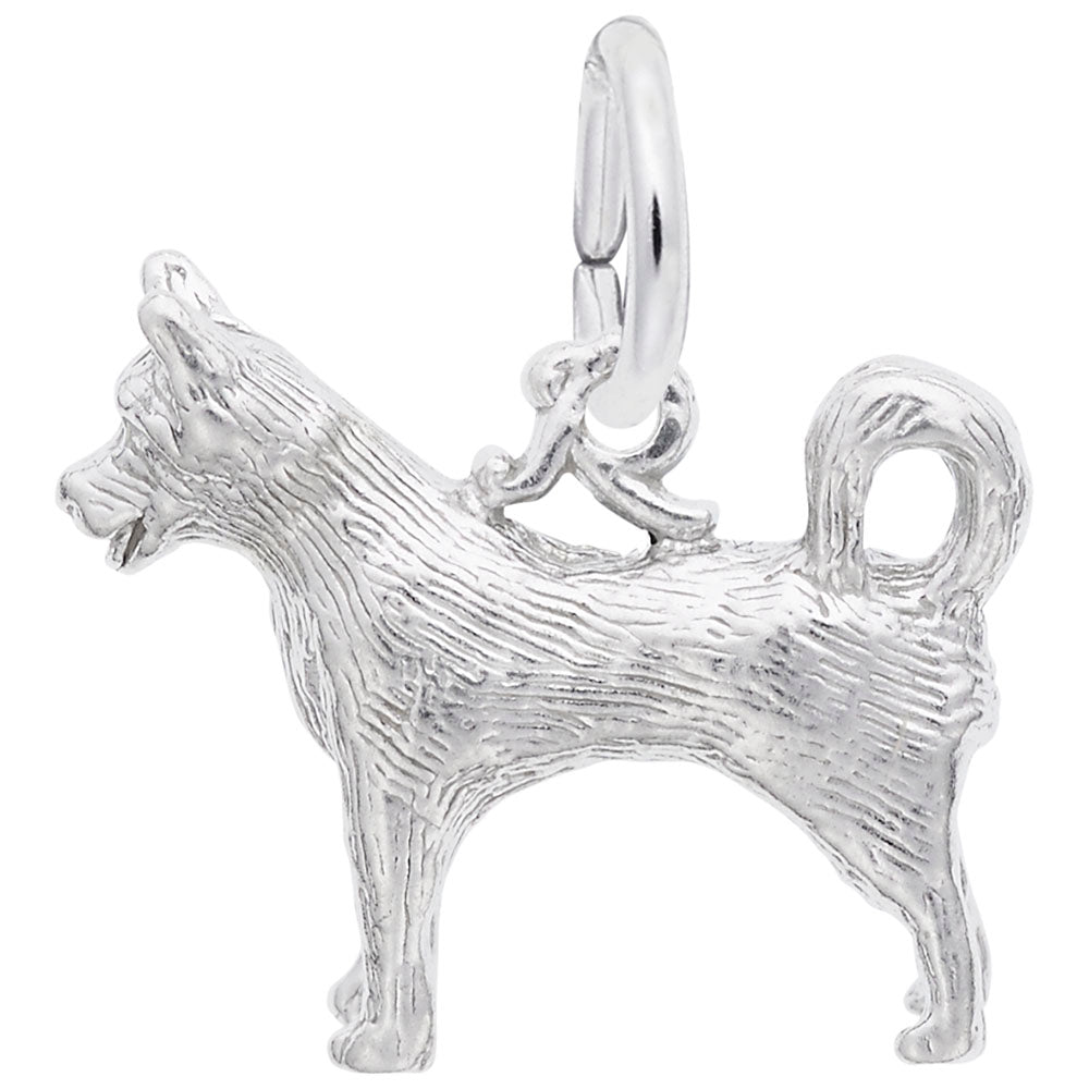 Silver husky dog charm on a white background