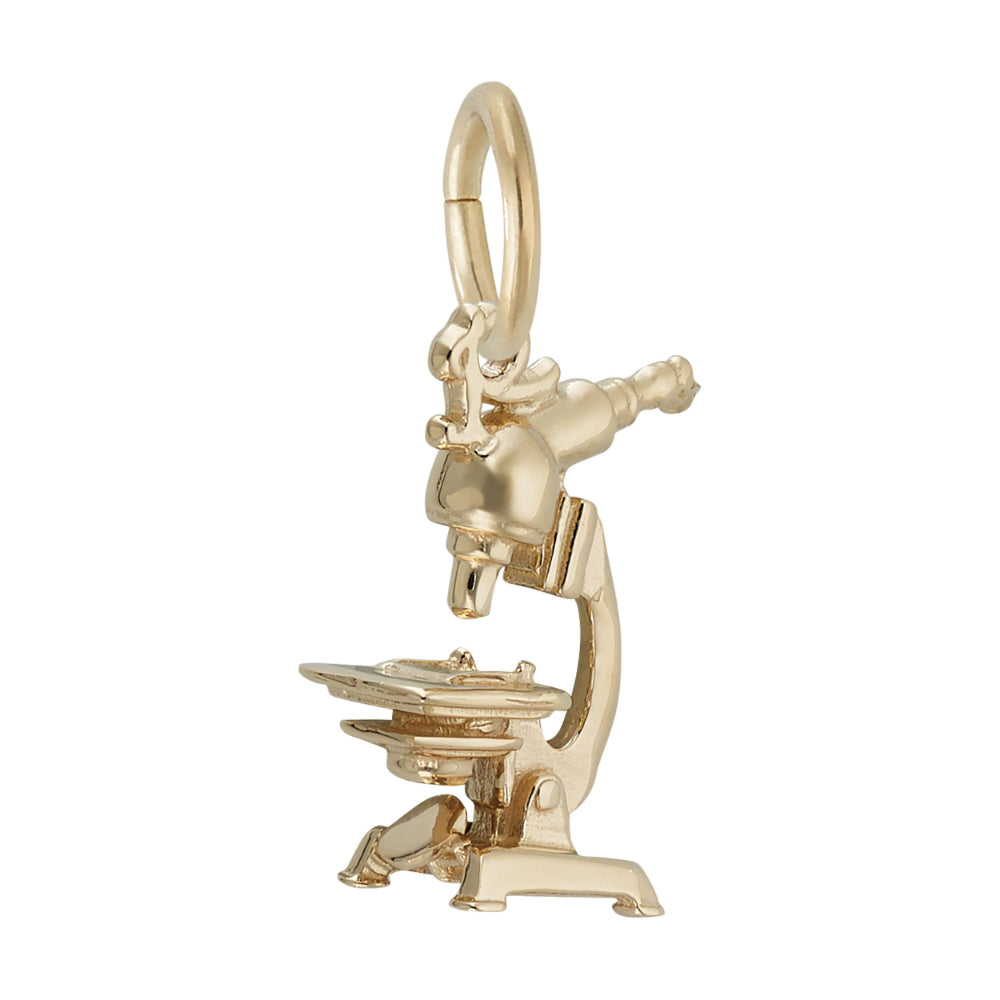 3/4 view of a Gold microscope charm on a white background