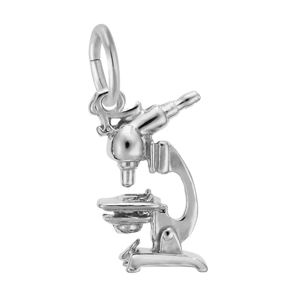 Silver microscope charm on a white background