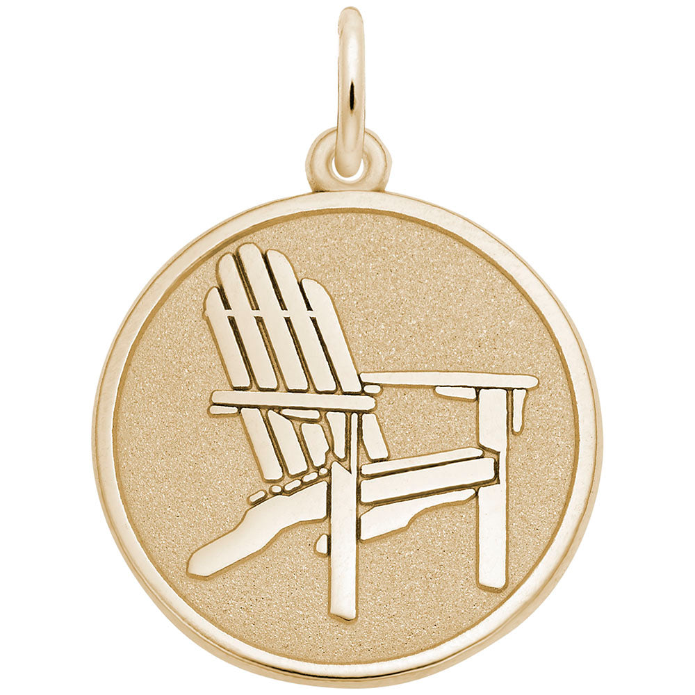 Gold charm with Adirondack chair design on a white background