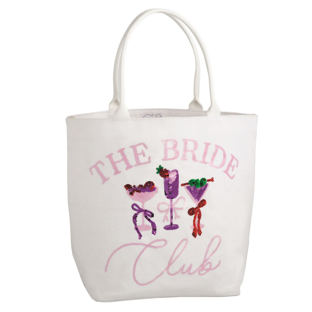 White tote bag with 'The Bride Club' text and cocktail graphics on a white background.