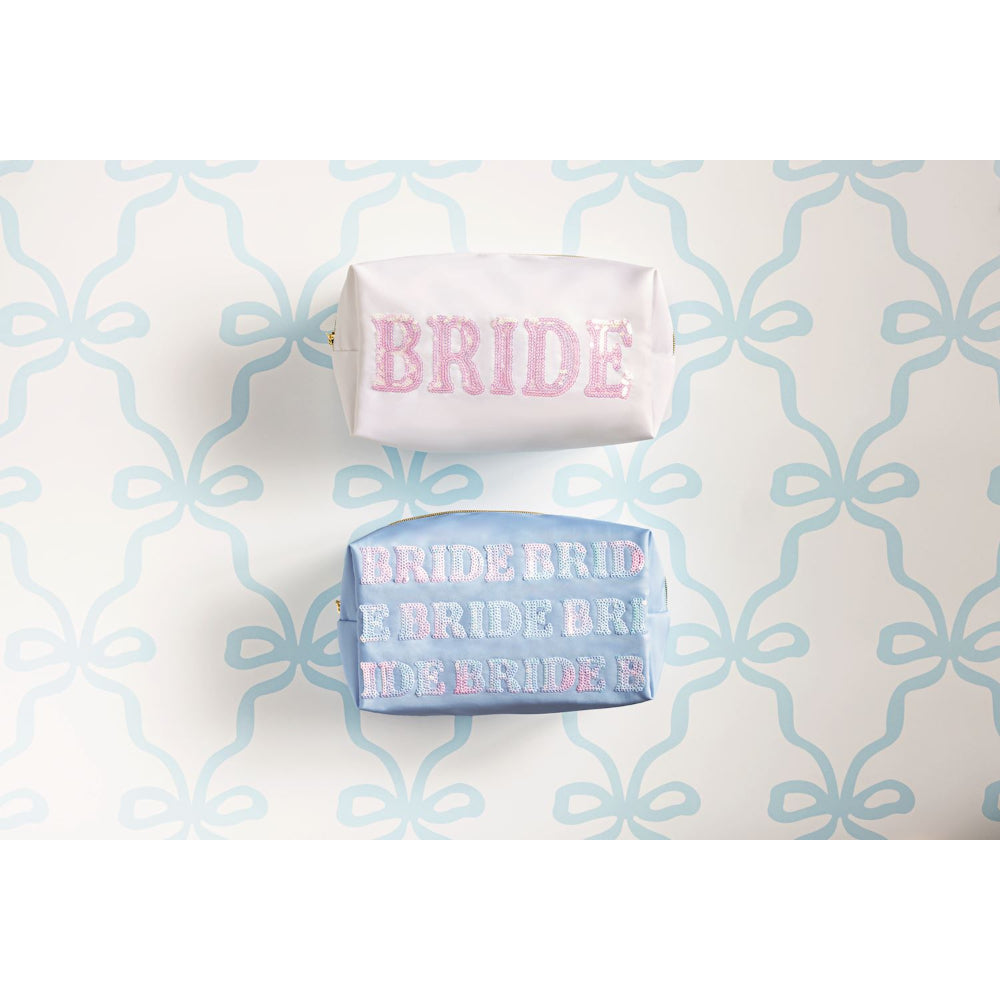 Two make up bags in blue and white with 'BRIDE' text on a patterned background.