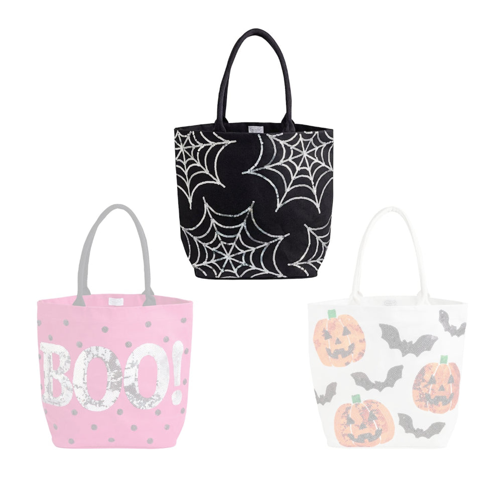Black halloween-themed tote bag with a sliver spider web design on a white backround. 