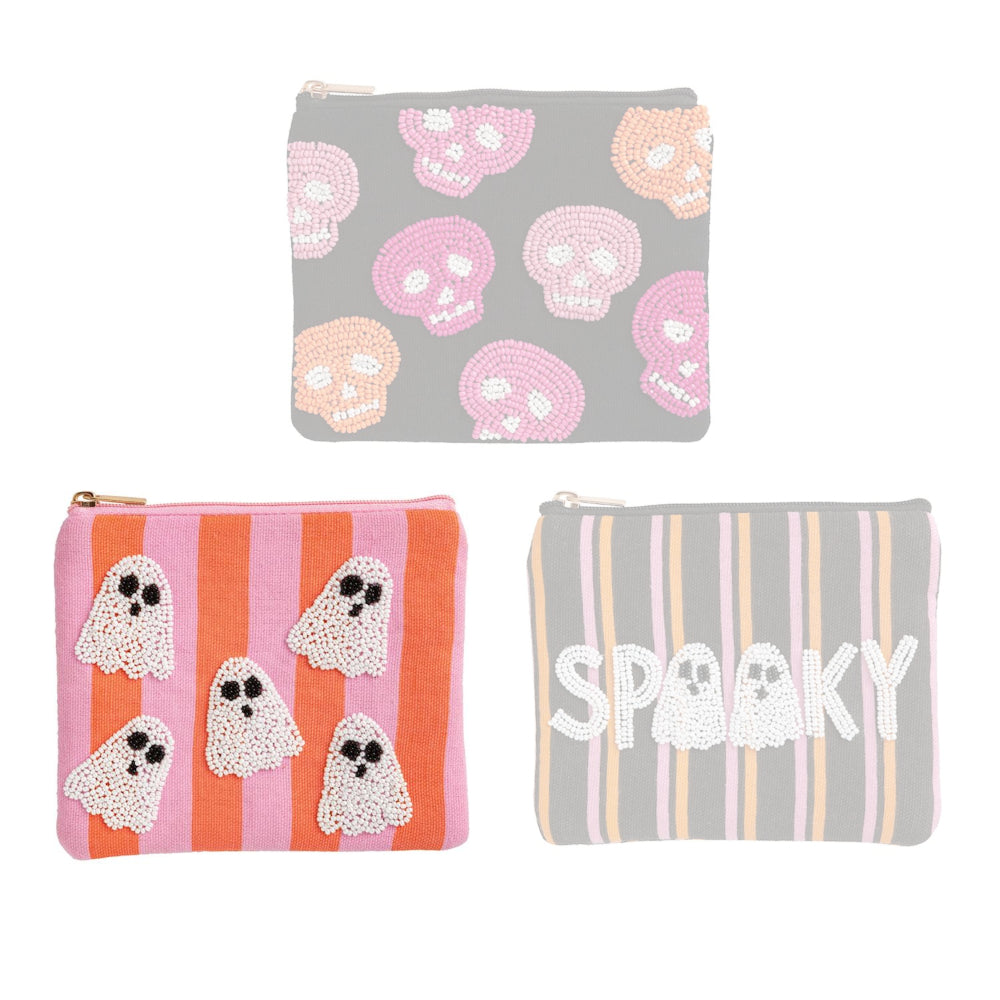 Three Halloween-themed pouches with skull, ghost, and 'Spooky' designs on a white background.