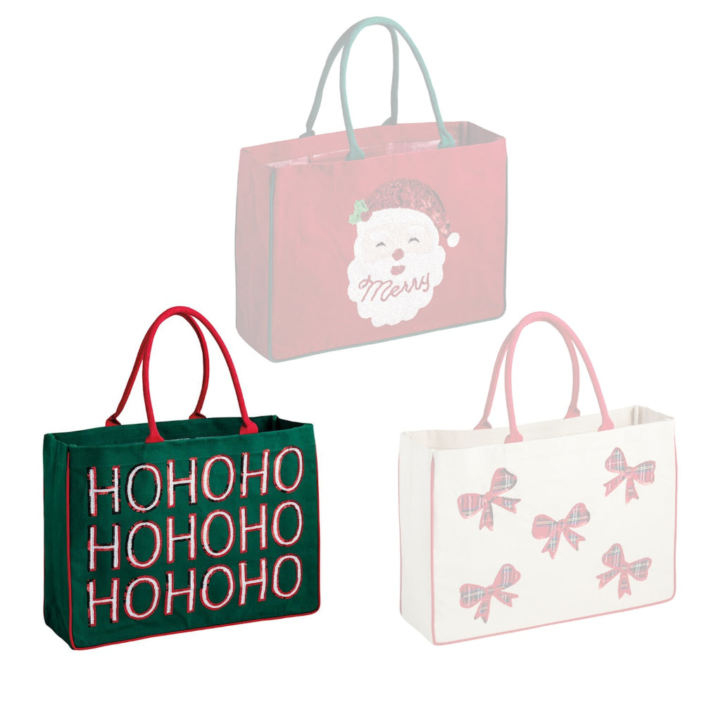 Three Christmas-themed gift bags with different designs on a white background.