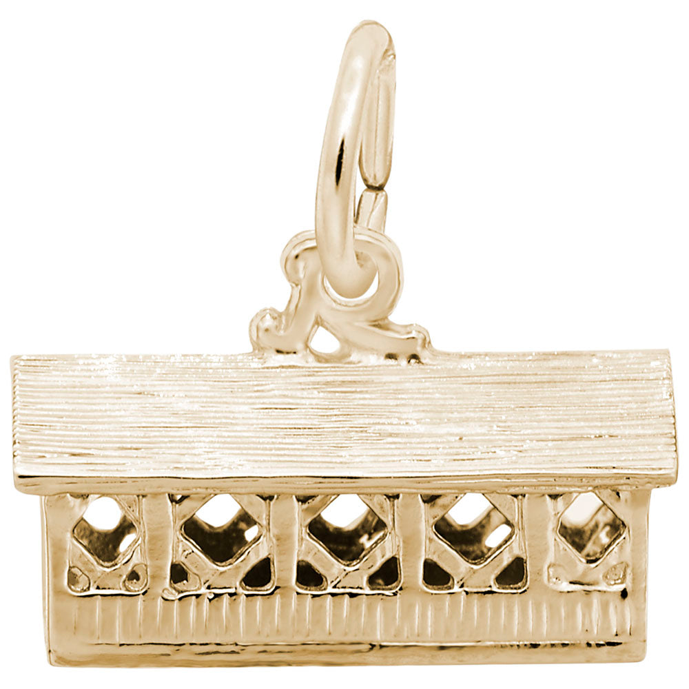 Gold covered bridge charm with textured roof and sides, shown on a white background