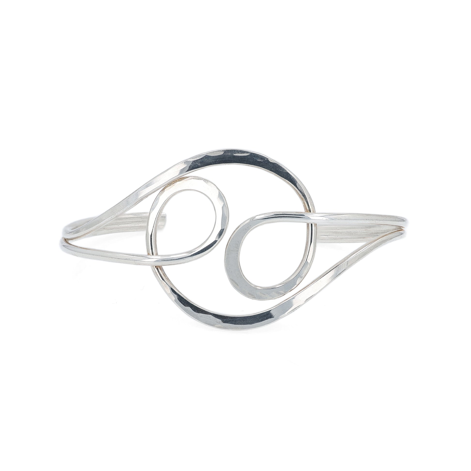 Sterling silver hammered open work angle bracelet on a white background