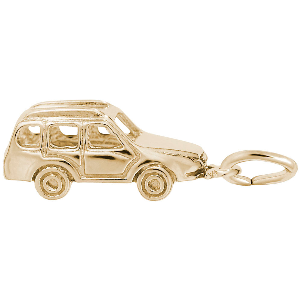 Gold car-shaped charm on a white background