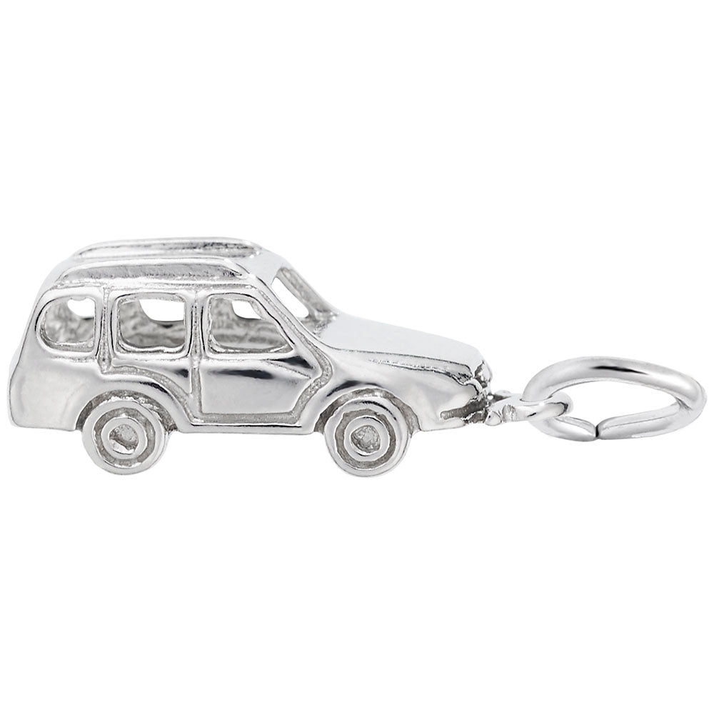 Silver car-shaped charm on a white background