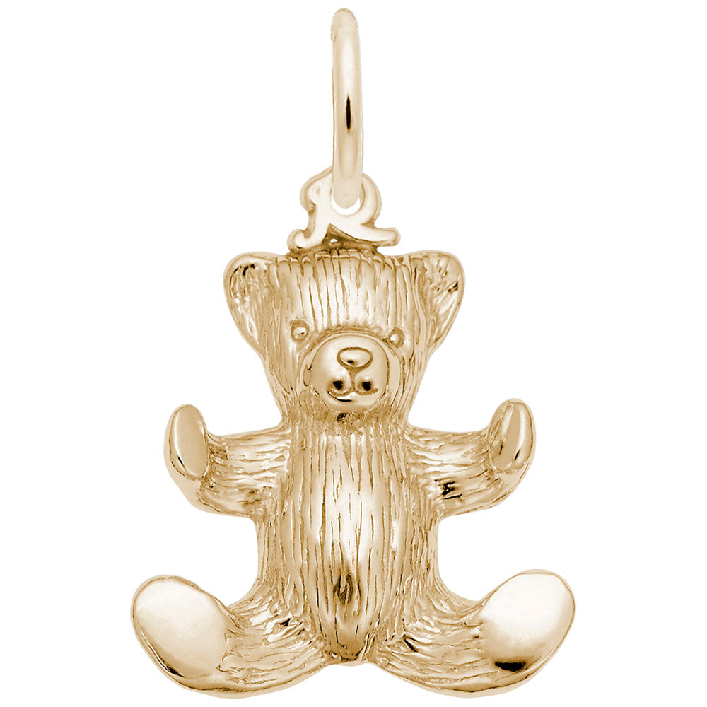 Gold teddy bear charm on a white background