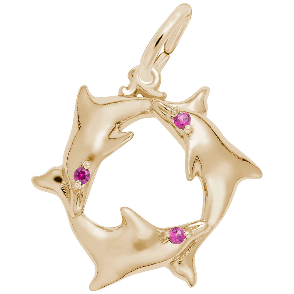Gold charm featuring 3 dolphins in a circle with red stone eyes, shown on a white background