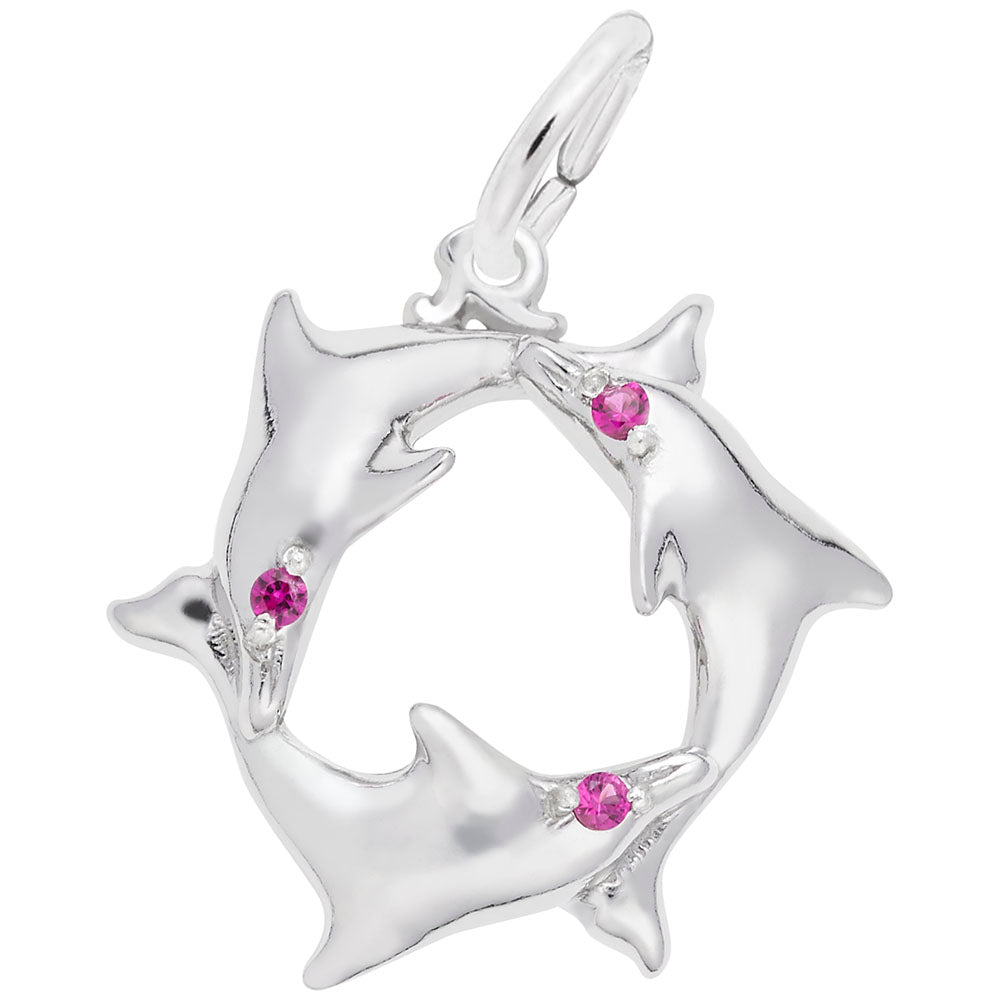 Silver charm featuring 3 dolphins in a circle with red stone eyes, shown on a white background