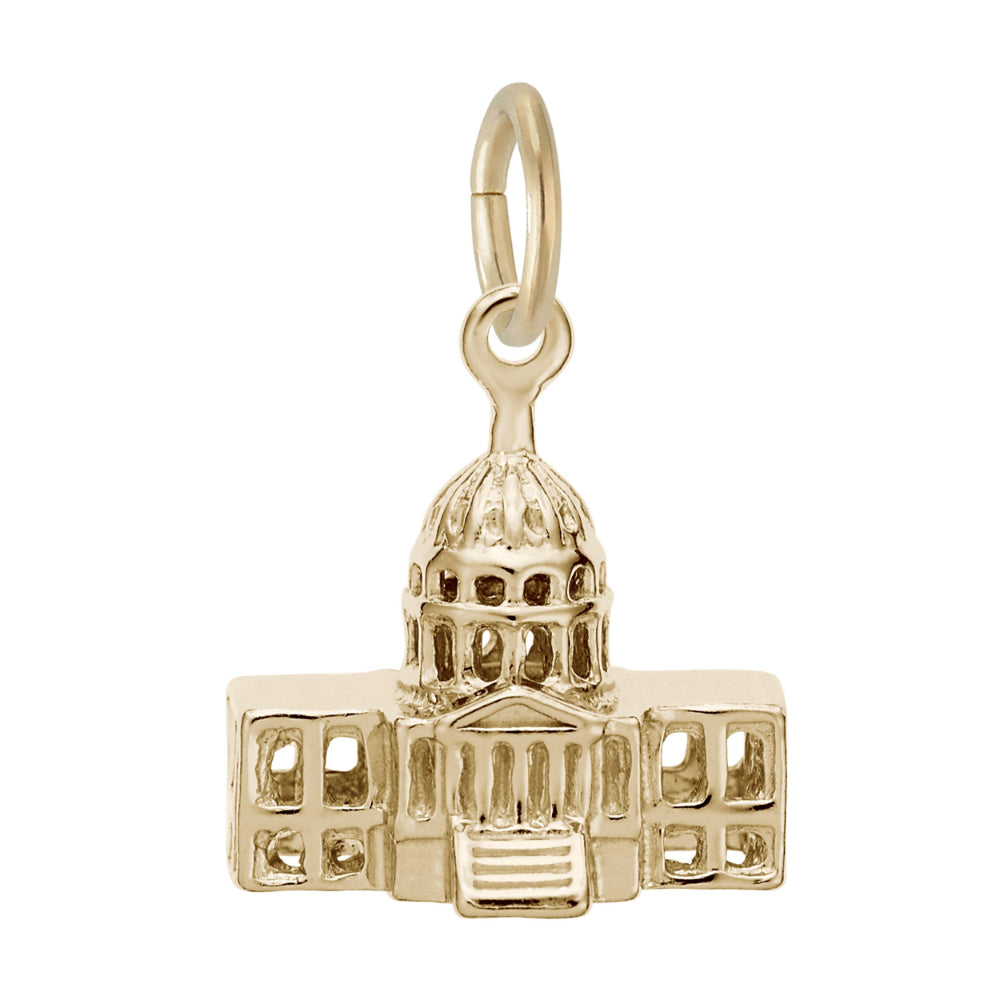 Front of a gold charm shaped like the US Capitol building, featuring a detailed dome and surrounding structure, shown on a plain white background.