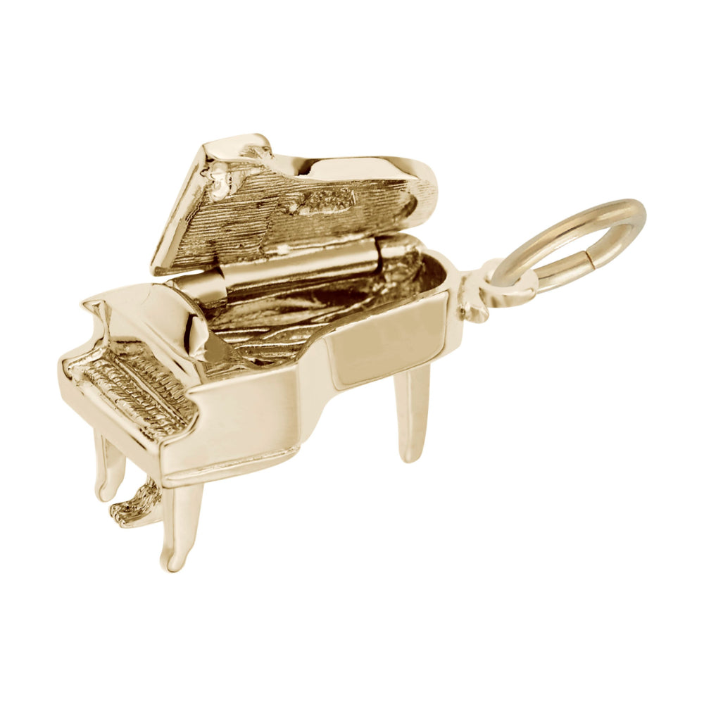 A polished gold charm shaped like a grand piano with the lid open, featuring key and string detailing, shown on a plain white background.