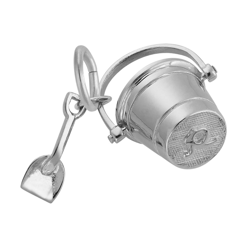 Bottom of a Silver bucket and shovel charm on a white background