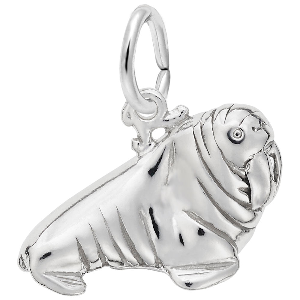 Detailed silver walrus charm on a white background