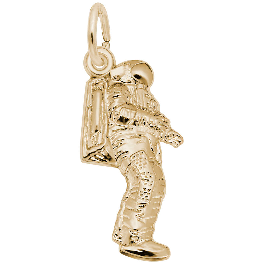 Gold astronaut charm on a white background