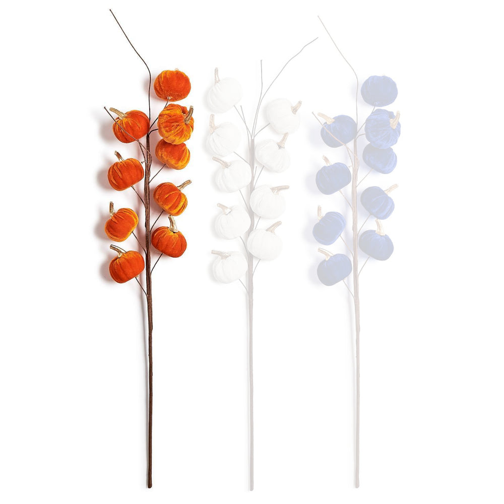 Orange pumpkin decorative artificial branche on a white background.