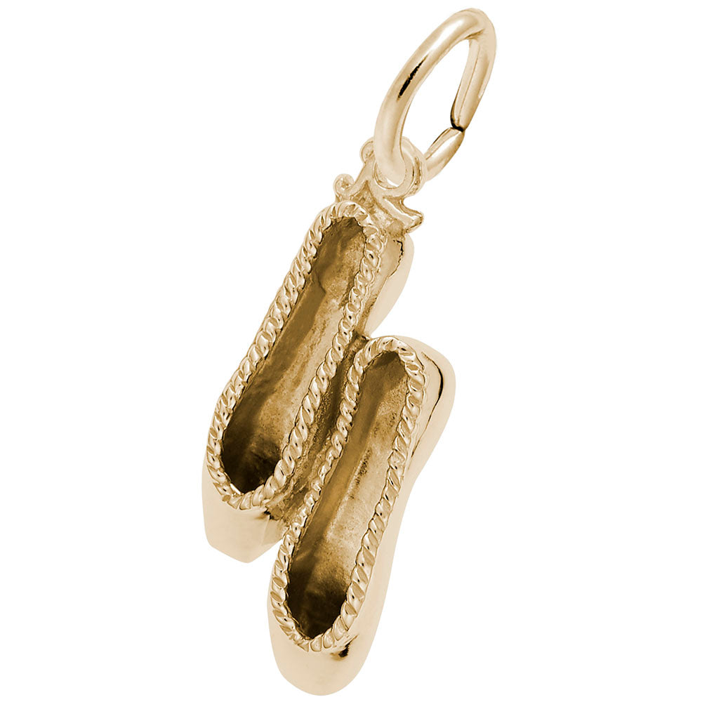 Gold ballet slippers charm, shown on a white background