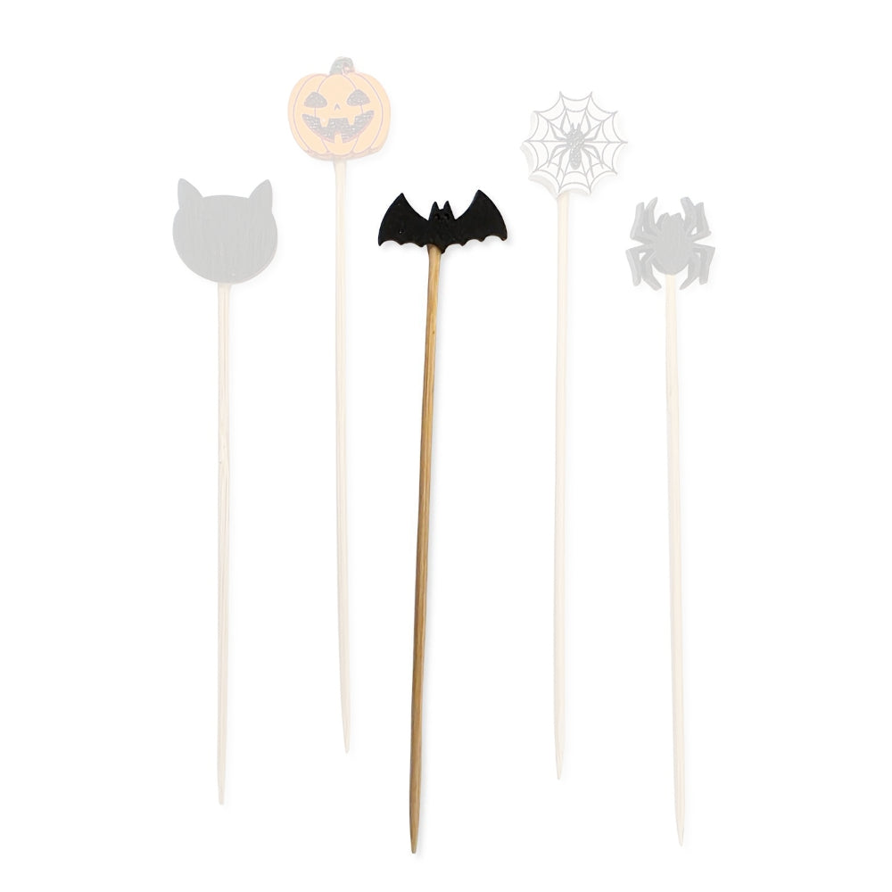 Black bat halloween-themed wooden cocktail pick with a black bat design on a white backround.