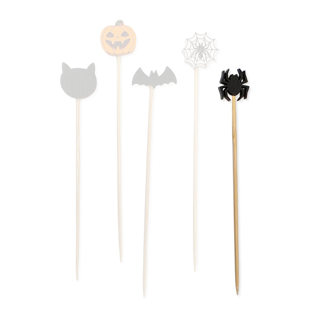 Black spider Halloween-themed wooden cocktail pick with black spider  design on a white backround.