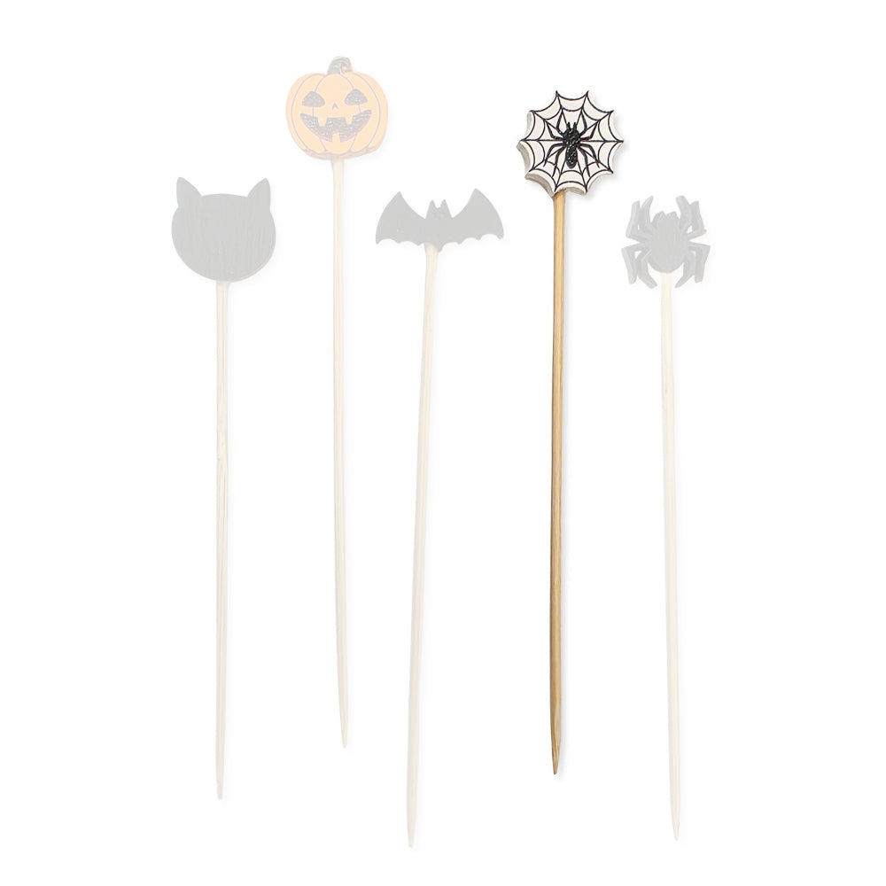 Spider web halloween-themed wooden cocktail pick with black spider web design on a white backround.