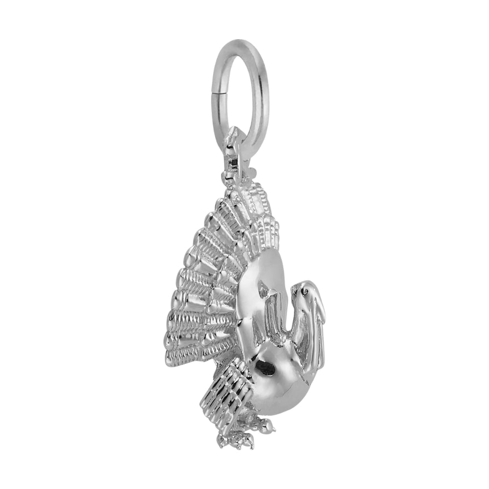 Silver Turkey Charm with detailed feathering, shown facing the right on a plain white background
