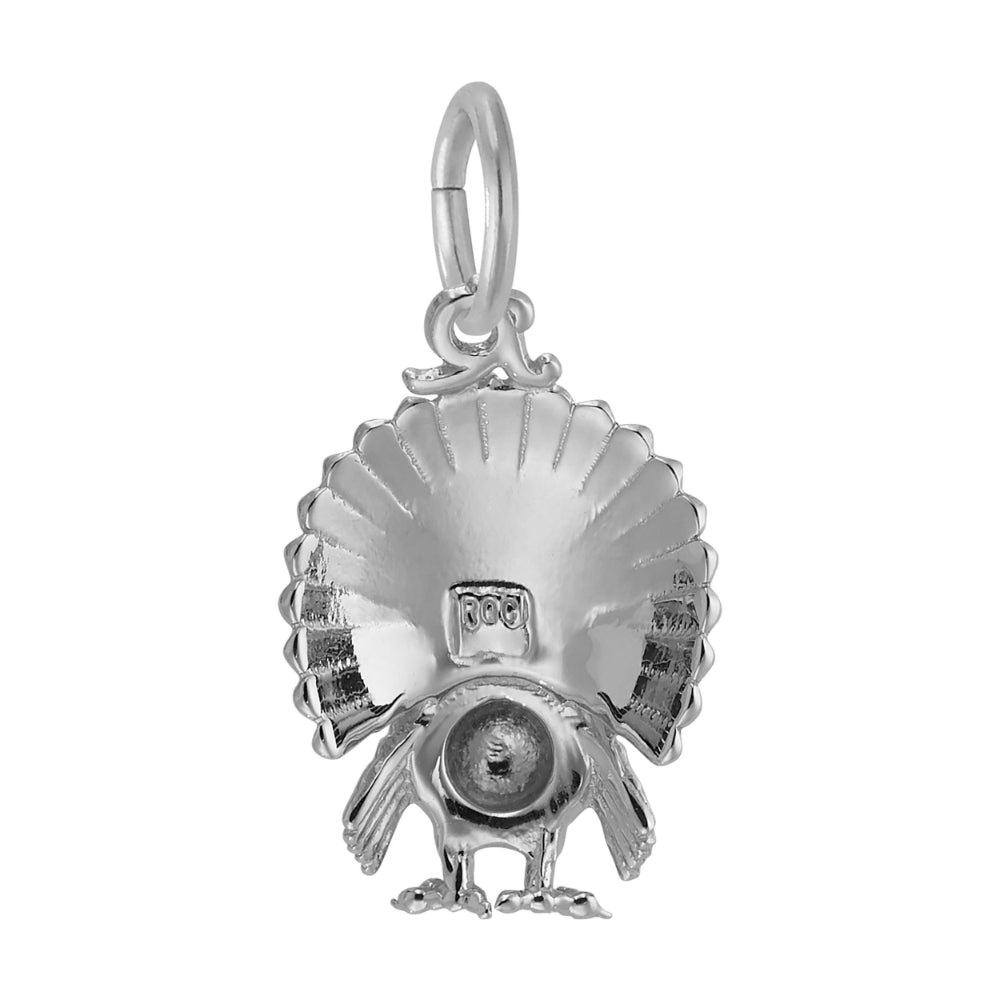 Silver Turkey Charm with detailed feathering, shown facing backward on a plain white background