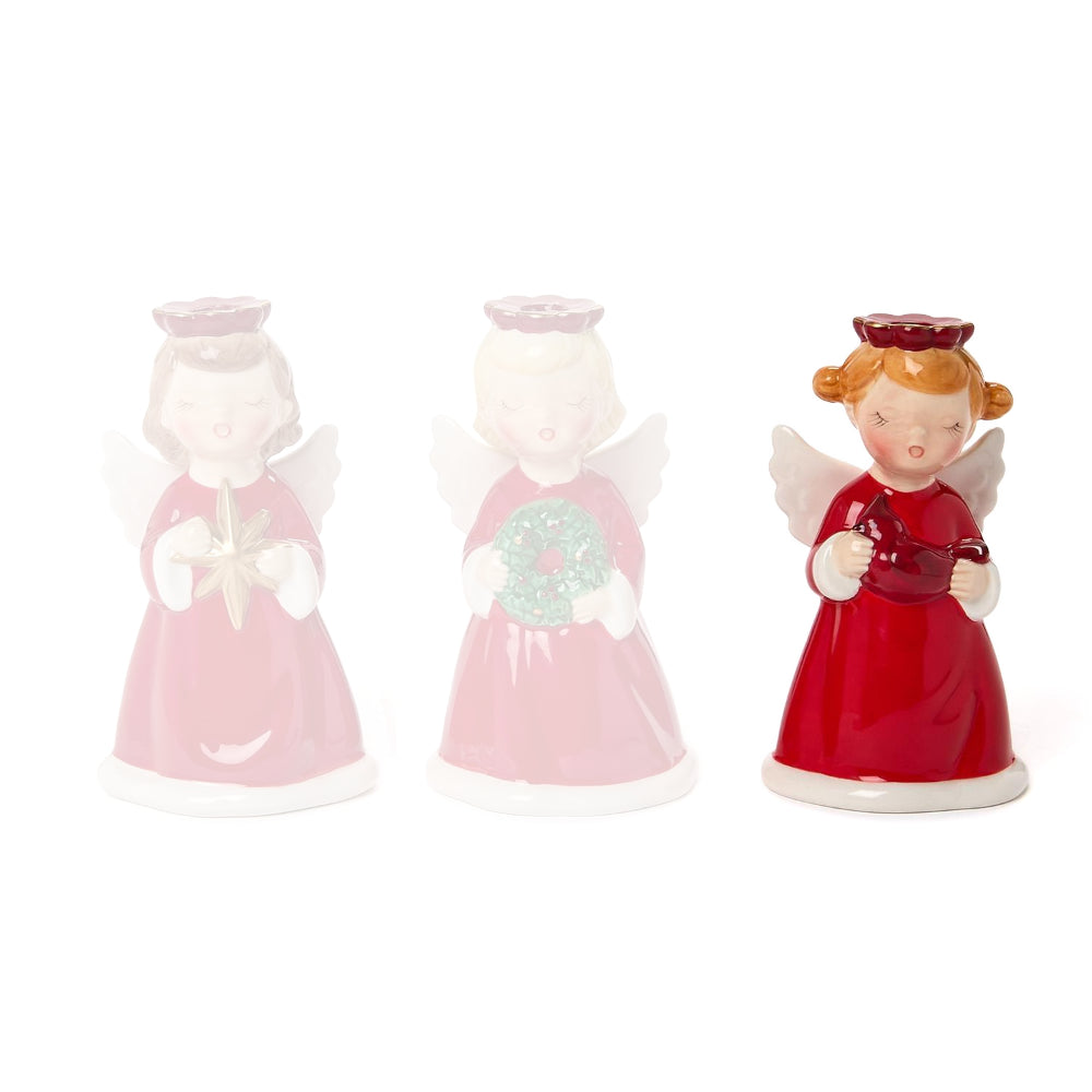 Angel figurine candle holder in a red dress with white wings and a red holo holding a red cardinal on a white backround.