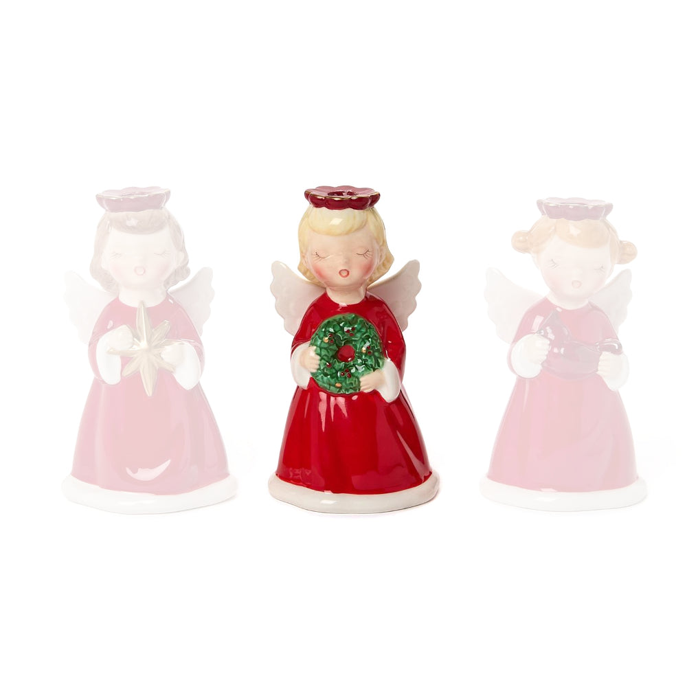 Angel figurine candle holder in a red dress with white wings and a red holo holding a green wreath on a white backround.