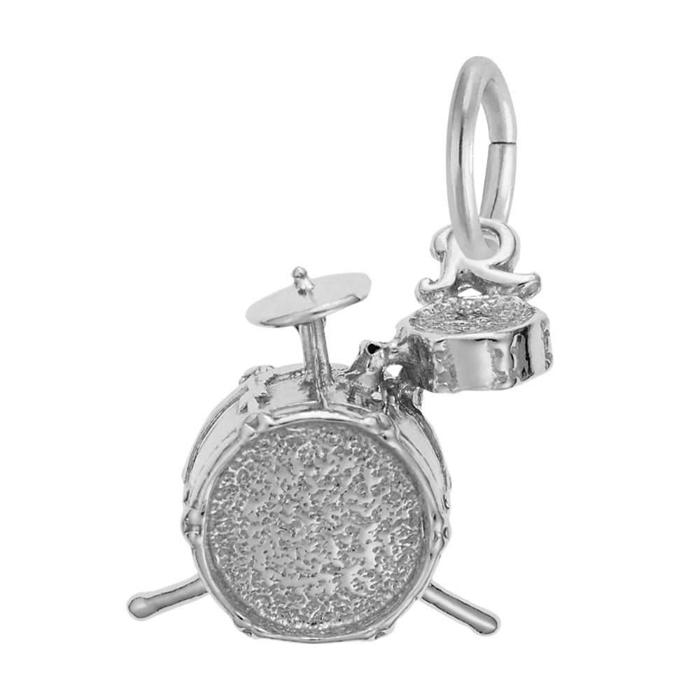 A silver drummer charm featuring a main bass drum, a smaller tom, and cymbal, shown on a plain white background.