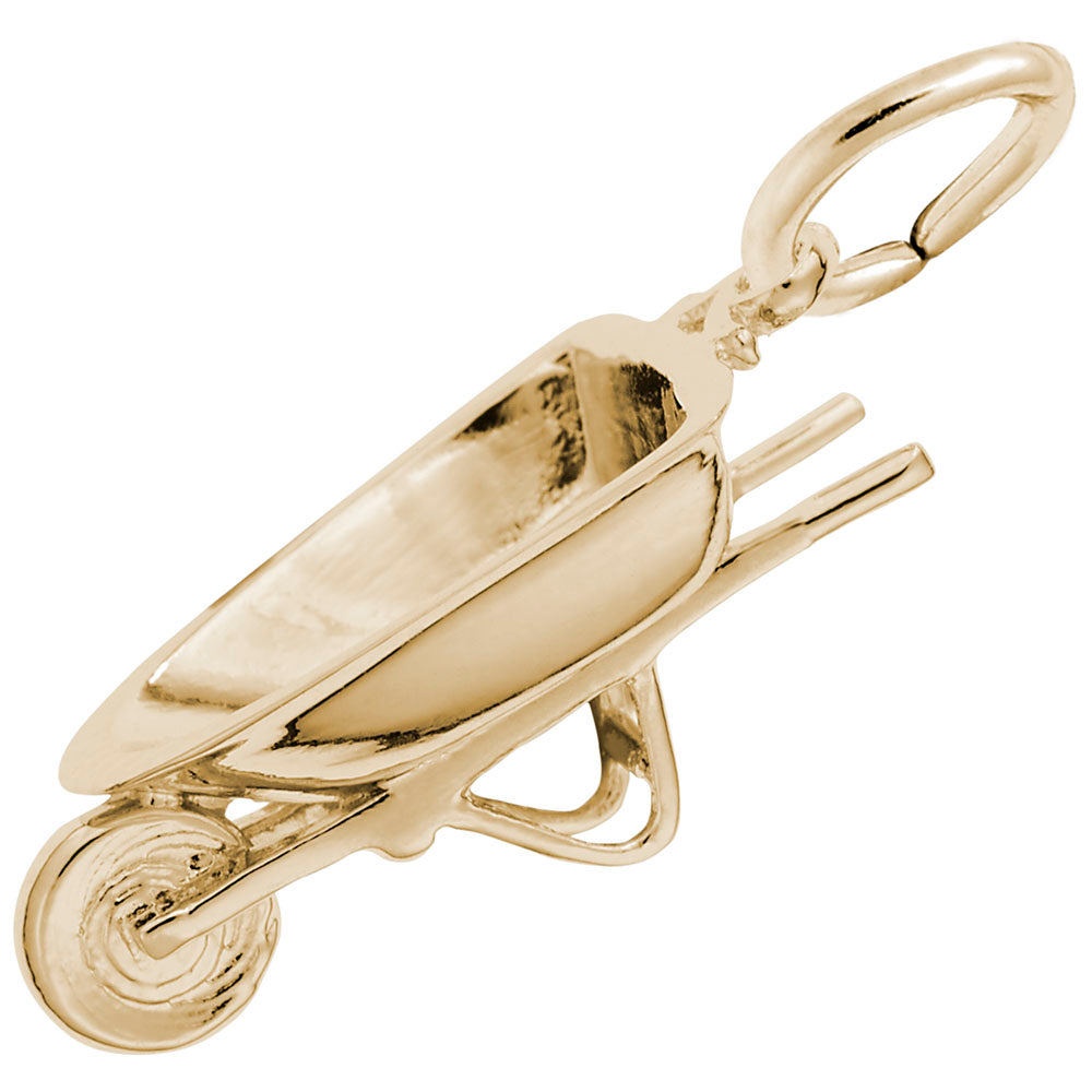 Gold wheelbarrow charm on a white background