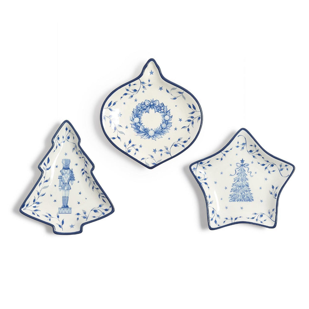 Three decorative ceramic plates with blue floral and Christmas-themed designs on a white background.
