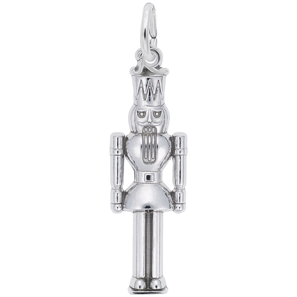 A polished silver nutcracker king charm with detailed engravings, shown against a solid white background.