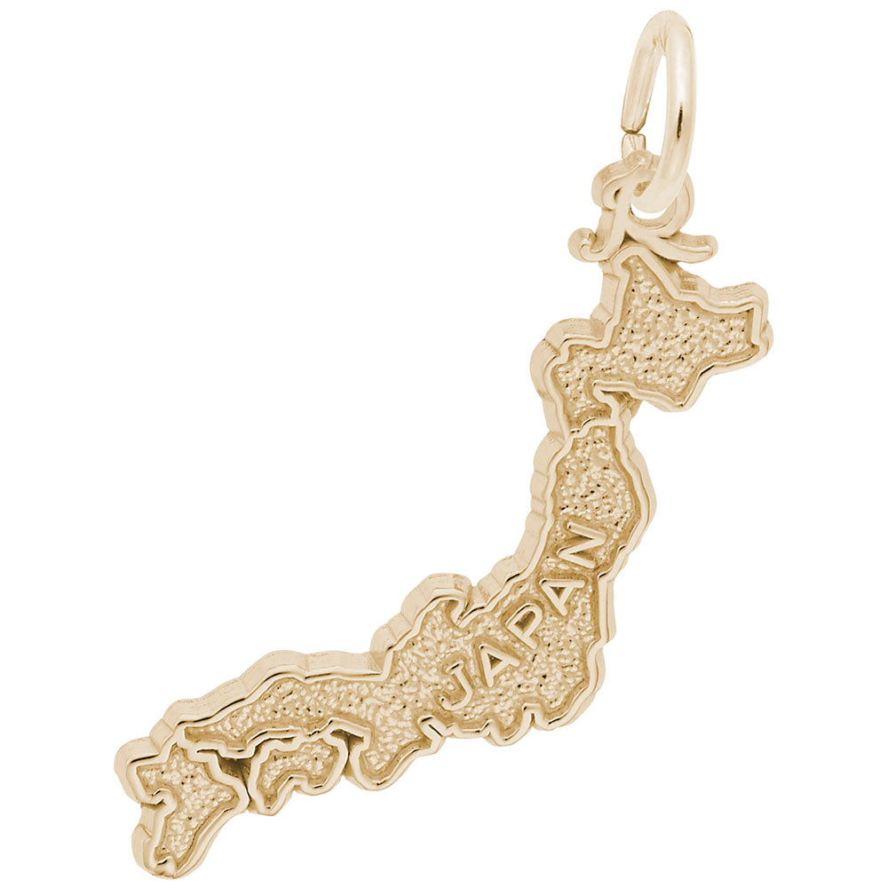 Gold charm shaped like Japan with a textured finish and "JAPAN" text, shown on a plain white background 
