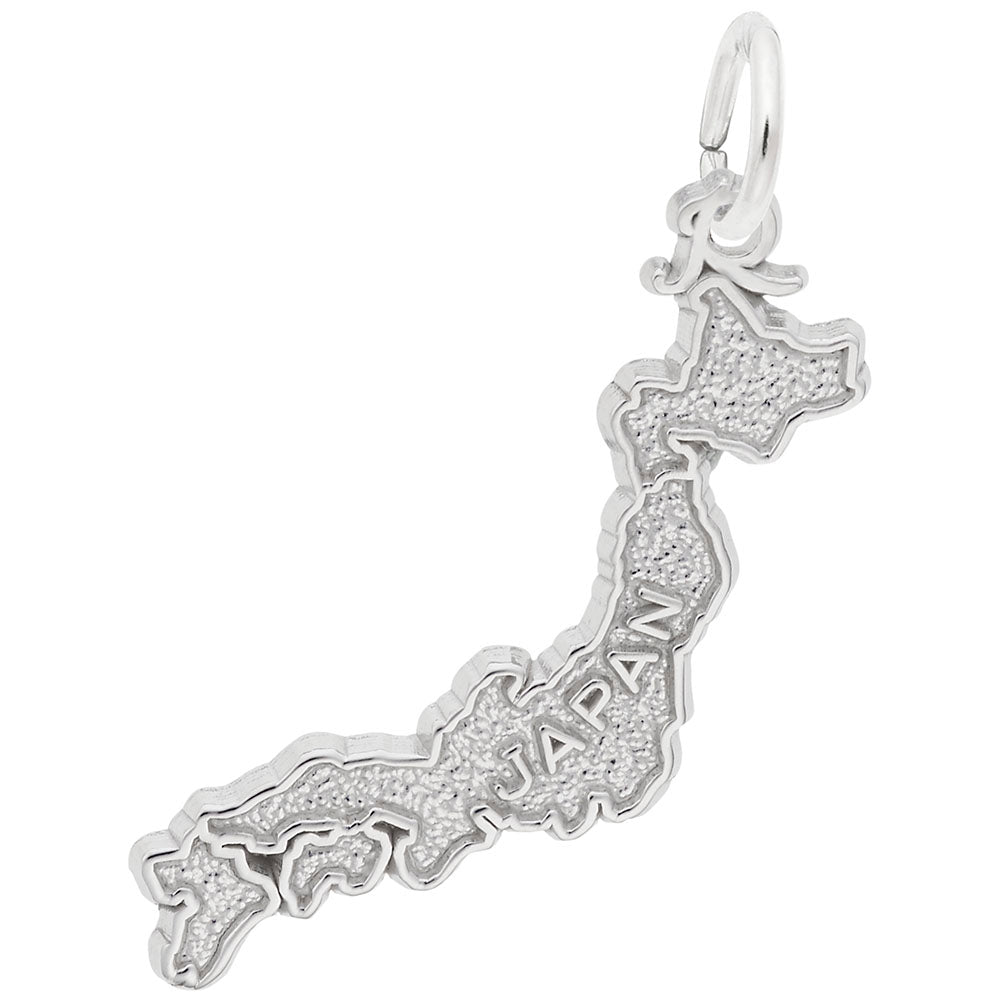 Silver charm shaped like Japan with a textured finish and "JAPAN" text, shown on a plain white background 