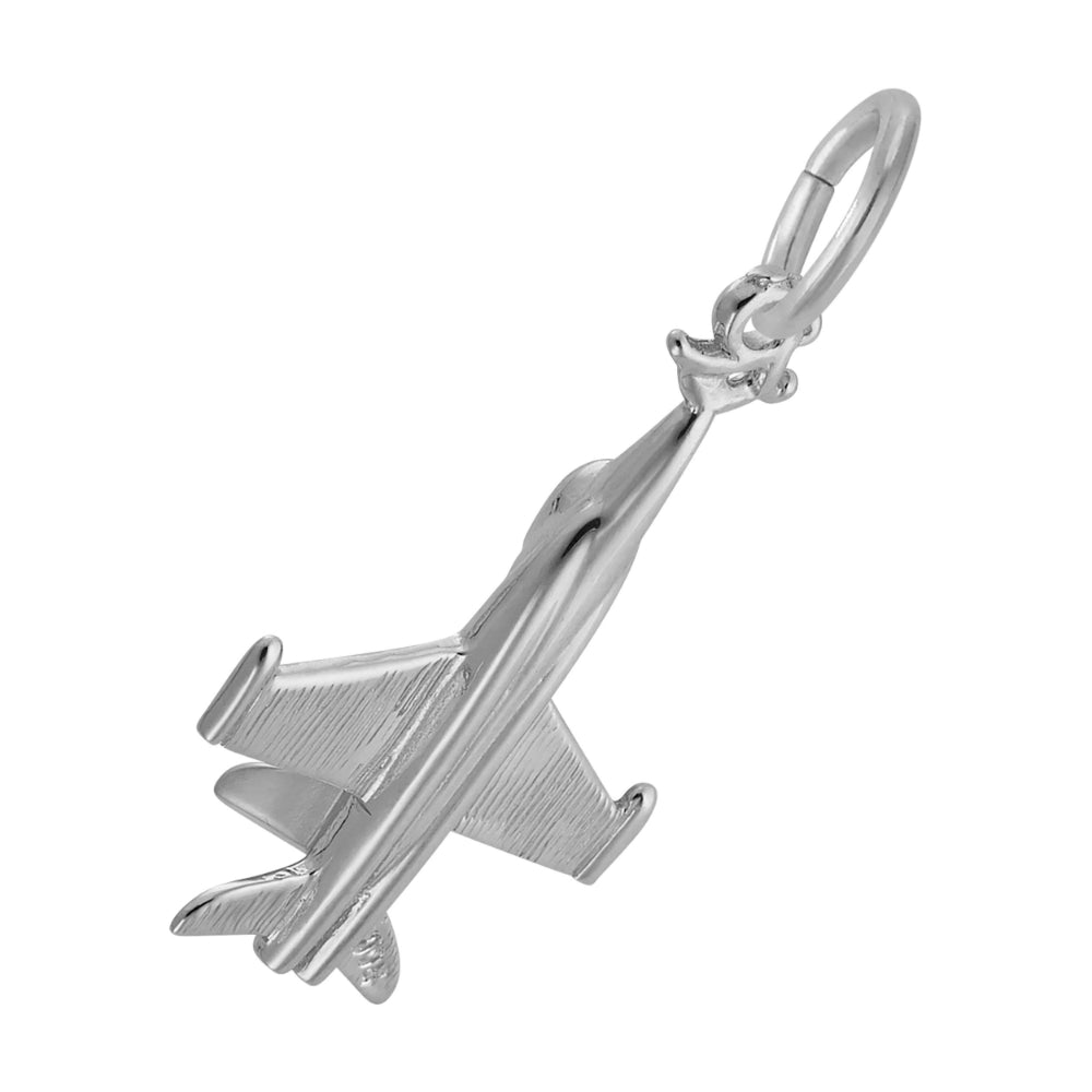 Bottom view of a silver charm shaped like a fighter jet pointing towards top right shown on a white background