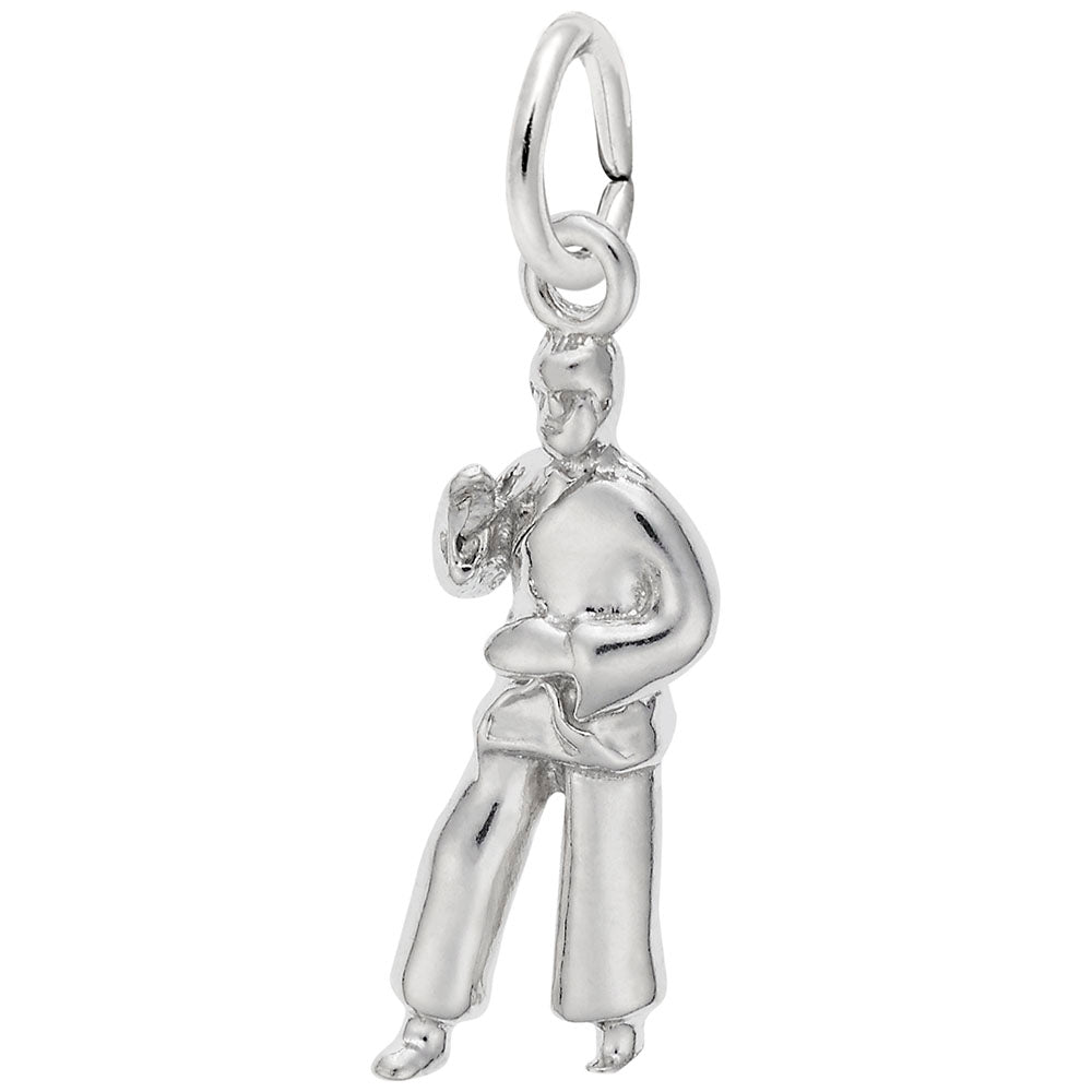 Silver charm depicting a martial arts figure, shown on a white background