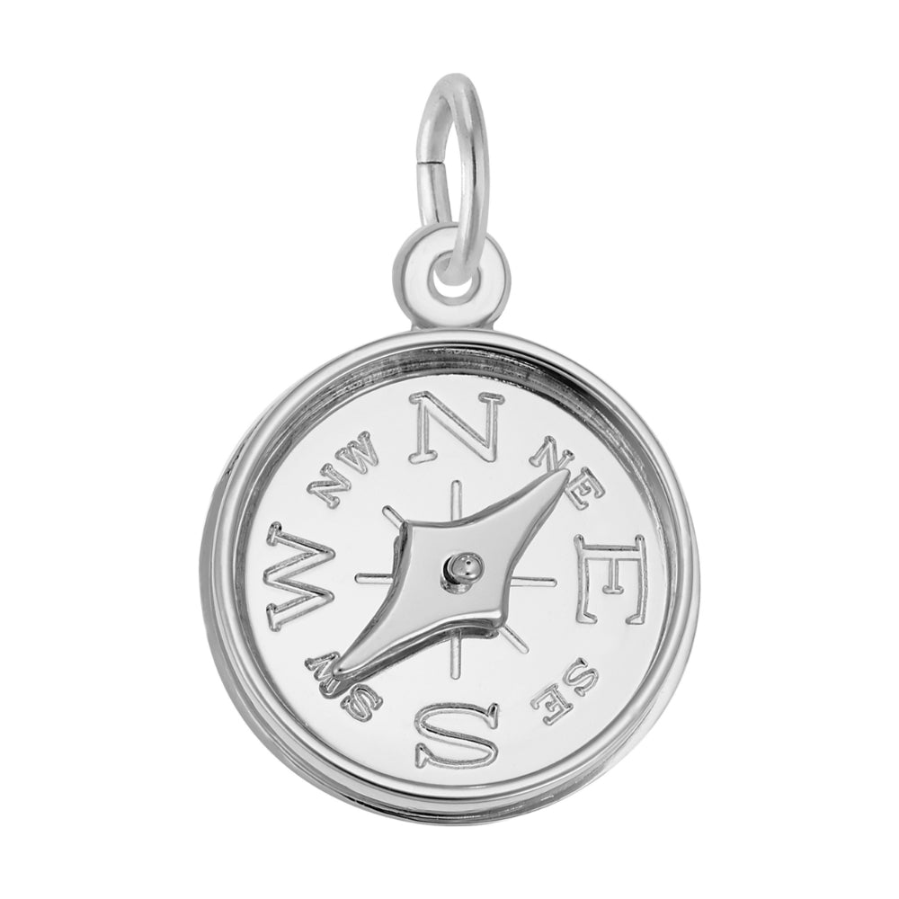 A round silver compass pendant charm with engraved cardinal directions and a central rose and needle, shown on a plain white background.