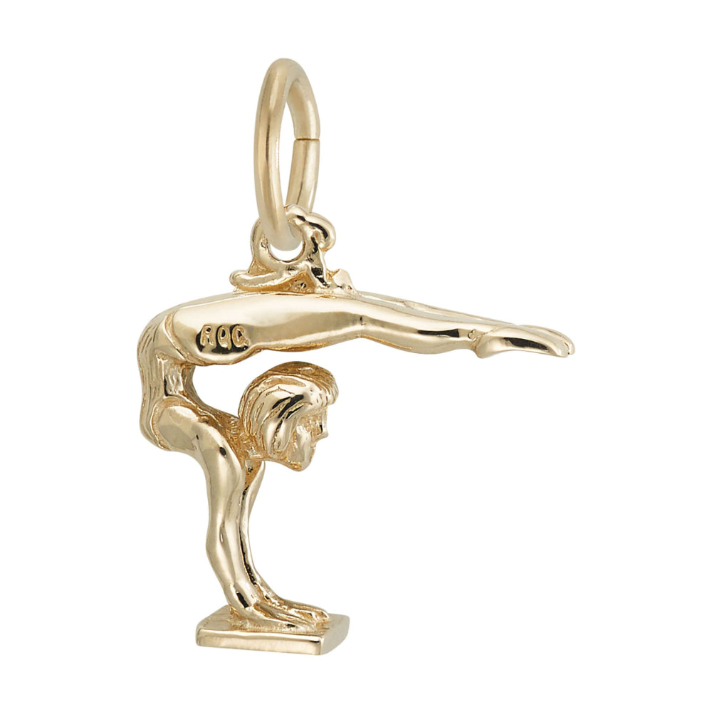 A polished gold charm shaped like a gymnast performing a handstand with legs extended horizontally to the right, shown on a plain white background.