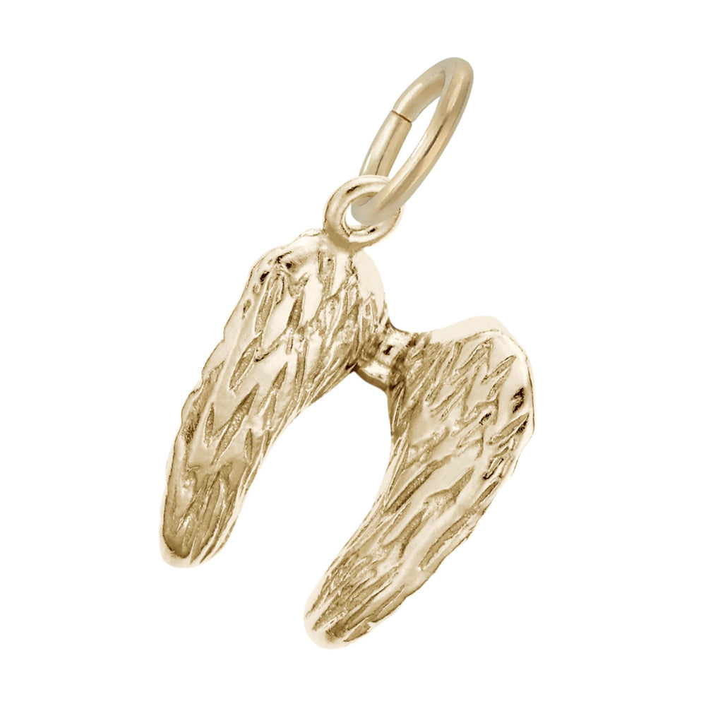 Gold angel wing charm on a white background
