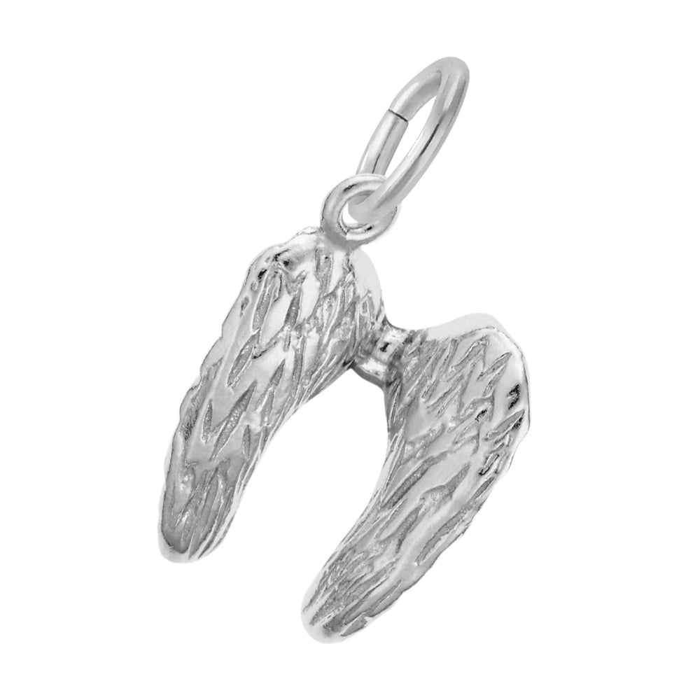 Silver angel wing charm on a white background