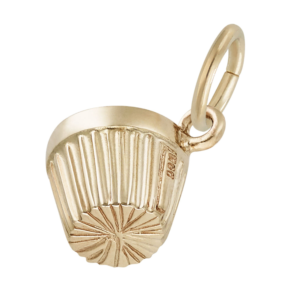 Side and bottom of a gold cupcake charm pendant featuring a textured cup shown on a plain white background