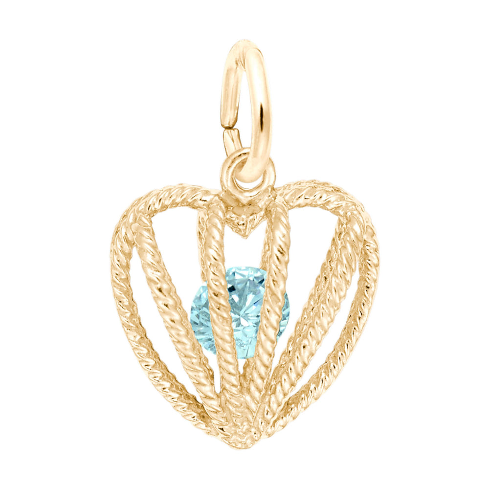 Gold heart-shaped pendant with a blue gemstone on a white background